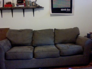 This is the beautiful, comfortable, more-expensive-than-anything-I'll-ever-be-able-to-afford-on-a-book-publishing-salary designer couch that I inherited when my office reorganized—and that my poor dad and coworker wrestled all the way up four flights of stairs only to find it was too large to fit through the hallway. It went home to Brooklyn in exchange for my old roommate's Ikea couch. Luckily tears are gluten-free, though I'm not sure crow is safe to eat.