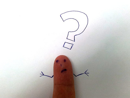 Image of thumb making "I don't know" face with question mark