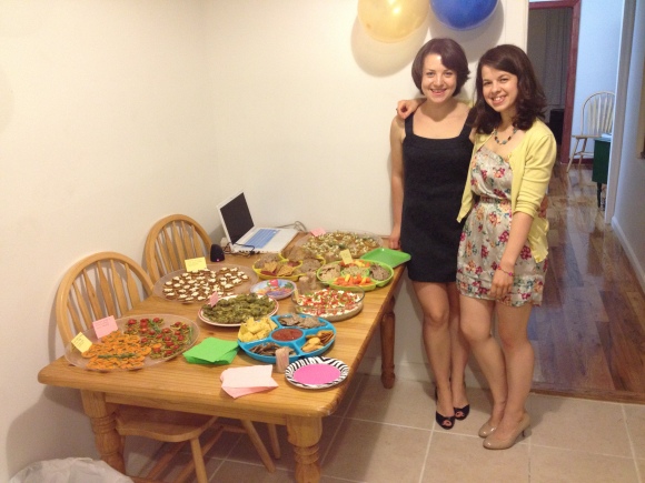 The proud hosts with the full spread (minus desserts; I'll tell you about those soon)